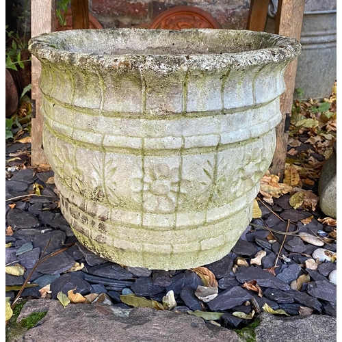 344 - A CAST STONE BARREL FORM GARDEN PLANTER
Flowerhead decoration.
(approx 36cm x 32cm)