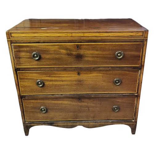 336 - A 19TH MAHOGANY AND SATINWOOD INLAID CHEST
With three long drawers, brass loop handles, on bracket f... 