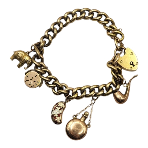 123 - FINE VICTORIAN 15CT GOLD CHARM BRACELET
With double curb links and locket, both stamped '15ct', set ... 