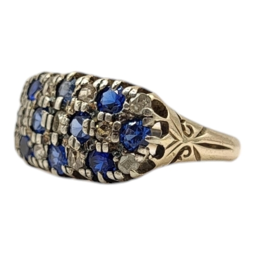 15 - WITHDRAWN! A VINTAGE 18CT GOLD, SAPPHIRE AND DIAMOND CLUSTER
Three rows of sapphires interspersed wi... 