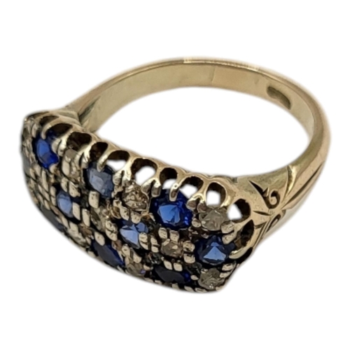 15 - WITHDRAWN! A VINTAGE 18CT GOLD, SAPPHIRE AND DIAMOND CLUSTER
Three rows of sapphires interspersed wi... 