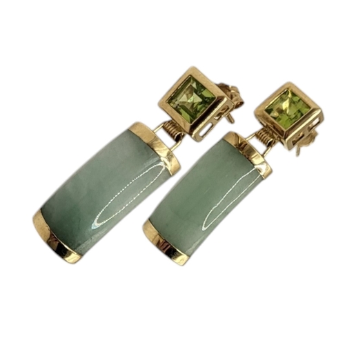 19 - A PAIR OF VINTAGE 9CT GOLD, PERIDOT AND JADE EARRINGS
The square cut peridot with convex jade drop.
... 