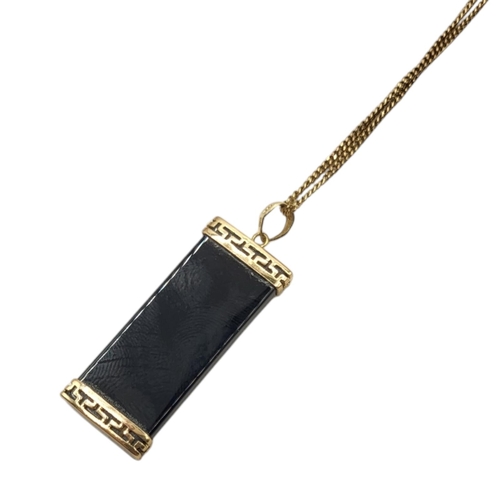 8 - A VINTAGE CHINESE 14CT GOLD AND ONYX PENDANT
Rectangular form with applied Chinese character, on a 9... 