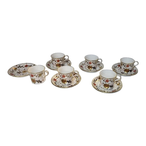 50 - A LATE 20TH CENTURY ROYAL CROWN DERBY BONE CHINA SET OF SIX CUPS AND SAUCERS 
All painted in modern ... 