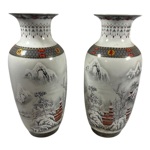 256 - A PAIR OF CHINESE REPUBLIC STYLE BALUSTER FORM VASES
Depicting a winter scene with logographic marki... 