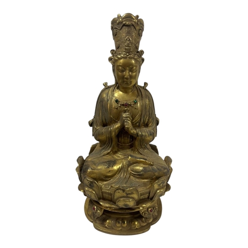 245 - A GILT BRONZE FIGURE OF TARA, IN THE MANNER OF QING DYNASTY
Wearing a jewelled dhoti beaded necklace... 