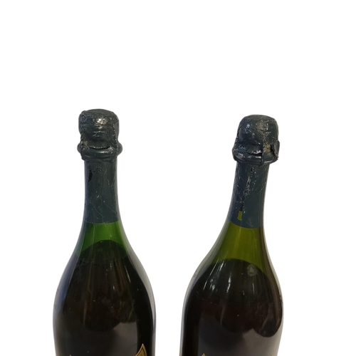 270 - 1964 DOM PÉRIGNON VINTAGE CHAMPAGNE, 12.5% ABV, 75cl (2 bottles in lot).


Condition: (Bottle 1) Lev... 