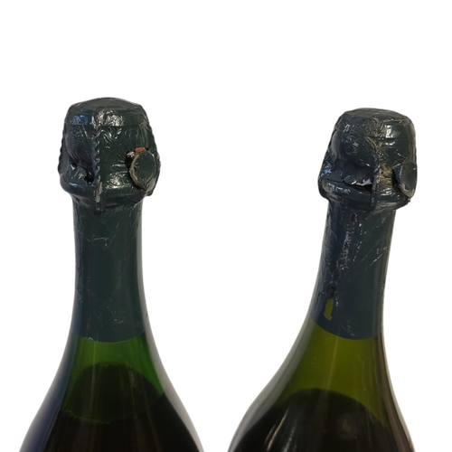 270 - 1964 DOM PÉRIGNON VINTAGE CHAMPAGNE, 12.5% ABV, 75cl (2 bottles in lot).


Condition: (Bottle 1) Lev... 