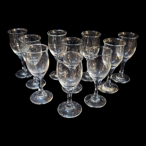 303 - HOLMGAARD, A SET OF TEN VINTAGE DANISH WHITE WINE GLASSES
Plain contemporary design.
(approx 18cm)