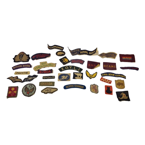 350 - A COLLECTION OF WWII CANADIAN MILITARY CLOTH BADGES
To include Seaforth Canada, 48th Highlanders, Ro... 