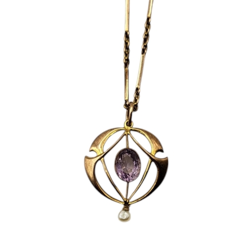 4 - AN ART NOUVEAU 9CT GOLD AMETHYST AND SEED PEARL PENDANT NECKLACE,
Oval cut amethyst in a pierced des... 