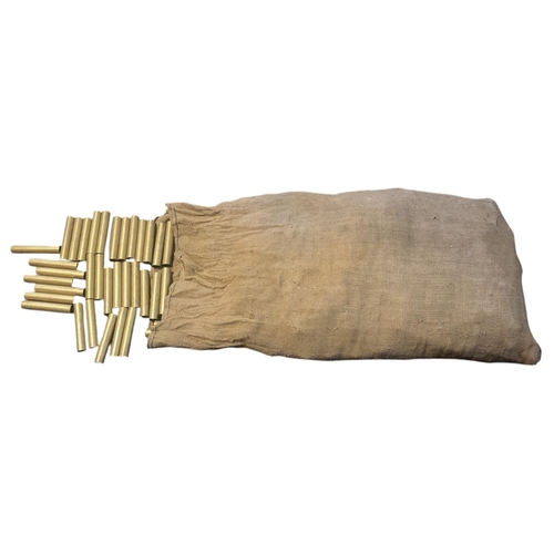 63 - A SACK OF SHORT CUT BRASS TUBES.