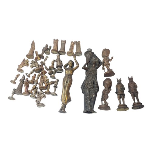 424 - A COLLECTION OF SOLID CAST BRASS FIGURES
Including a part chess set and Irking figures.
(largest app... 