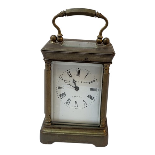 375 - AN ELLIOT & SONS OF LONDON, A BRASS MOUNTED MINIATURE CARRIAGE CLOCK/TIMEPIECE, CIRCA 1900
White ena... 