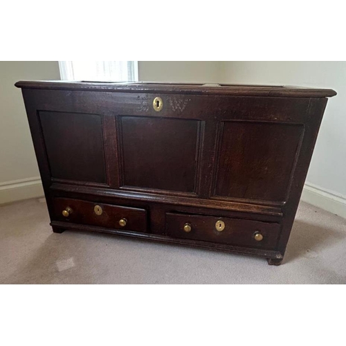 402 - AN 18TH CENTURY OAK MULE CHEST
With plain three panelled front above two drawers, bearing the initia... 