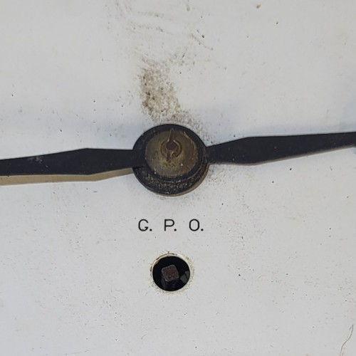 447 - AN EARLY 20TH CENTURY ‘POST OFFICE’ FUSEE WALL CLOCK
Circular dial marked ‘GPO’, painted case.
(appr... 