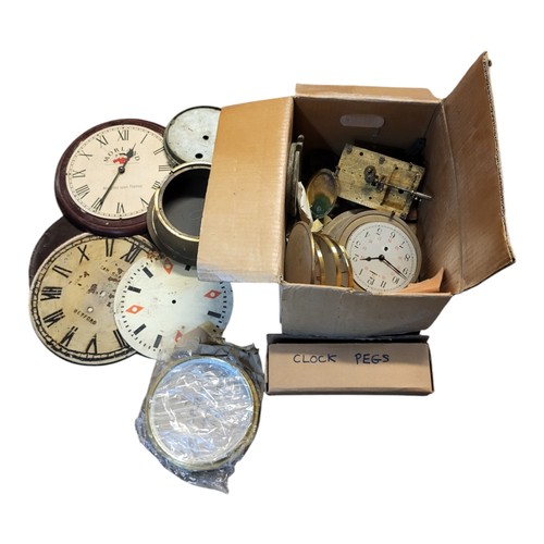 448 - A COLLECTION OF VINTAGE WALL CLOCK DIALS AND PARTS
To include a GPO dial with red diamond quarter ma... 