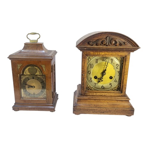 408 - THOMAS FRODSHAM, LONDON, A 20TH CENTURY WALNUT BRACKET CLOCK
Having a single carry handle, arched br... 