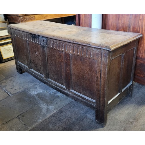 403 - A LARGE 17TH/18TH CENTURY OAK COFFER
With arched frieze above plane panels, on stile feet.
(153cm x ... 