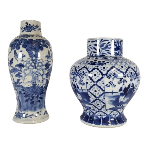 102 - A CHINESE QING DYNASTY BLUE AND WHITE BALUSTER SHAPED VASE, CIRCA 1900
Flora and fauna design, the b... 