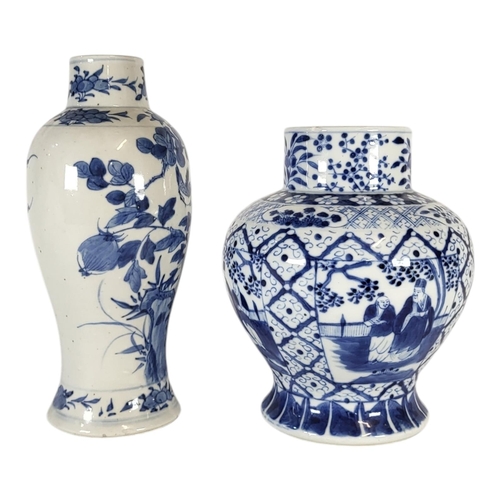 102 - A CHINESE QING DYNASTY BLUE AND WHITE BALUSTER SHAPED VASE, CIRCA 1900
Flora and fauna design, the b... 