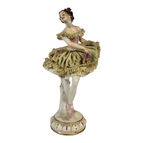 106 - A VOLKSTEDT PORZELLAN FABRIK OF THURINGIA HARD PASTE PORCELAIN MODEL OF CRINOLINE DANCING BALLERINA,... 