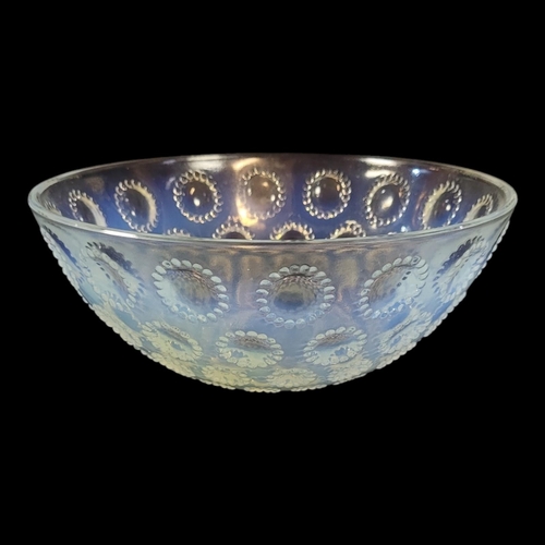 129 - LALIQUE, AN EARLY 20TH CENTURY ‘ASTER’ OPALESCENT GLASS BOWL
Having concentric flowerheads, engraved... 