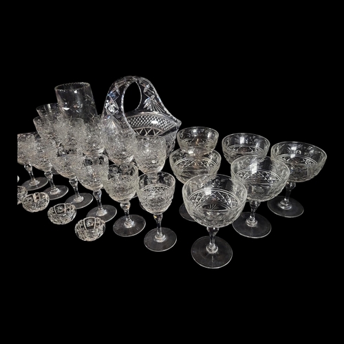 132 - A COLLECTION OF EARLY 20TH CENTURY CUT LEAD CRYSTAL GLASS
Comprising a sweetmeat basket, six champag... 