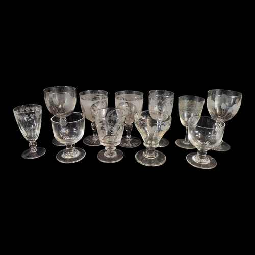 133 - A PAIR OF 18TH CENTURY RUMMER GLASSES
Plain form with stepped base, together with two 19th Century e... 