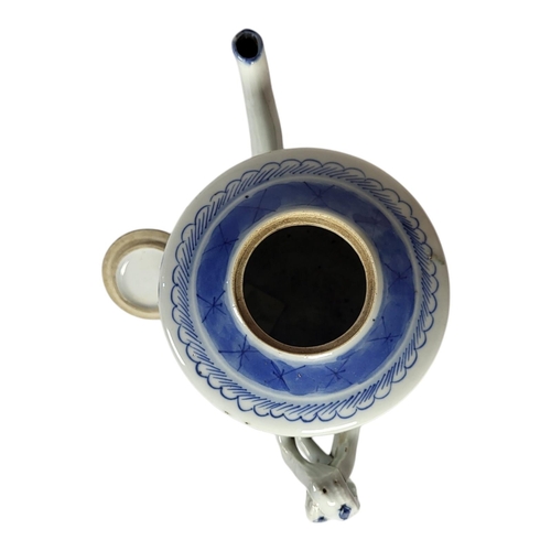 142 - AN 18TH CENTURY CHINESE EXPORT BLUE AND WHITE CYLINDRICAL TEAPOT AND COVER 
The entwined handle hard... 