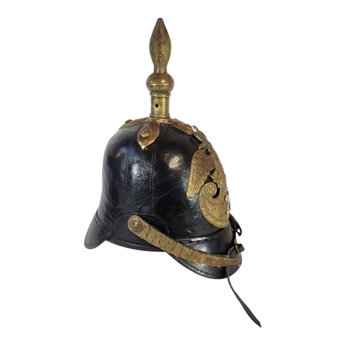 149 - AN EARLY 20TH CENTURY IMPERIAL RUSSIAN CRIMEAN WAR STYLE BRASS MOUNTED HELMET
Leatherhead helmet fea... 