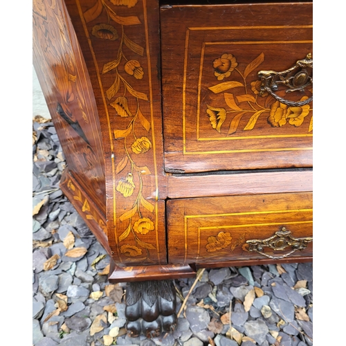 301 - A 19TH CENTURY DUTCH WALNUT AND FLORAL MARQUETRY INLAID DISPLAY CABINET ON BOMBE CHEST
The central c... 