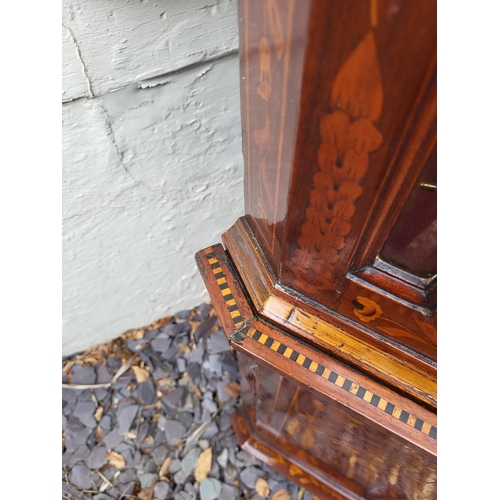 301 - A 19TH CENTURY DUTCH WALNUT AND FLORAL MARQUETRY INLAID DISPLAY CABINET ON BOMBE CHEST
The central c... 