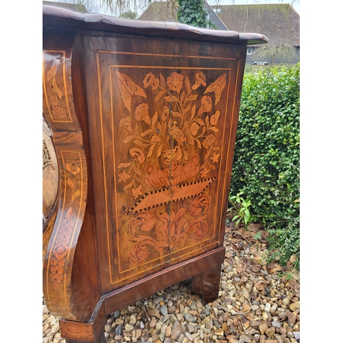 302 - A 19TH CENTURY DUTCH WALNUT AND FLORAL MARQUETRY INLAID BOMBE CHEST
The cartouche top above three lo... 