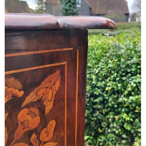 302 - A 19TH CENTURY DUTCH WALNUT AND FLORAL MARQUETRY INLAID BOMBE CHEST
The cartouche top above three lo... 