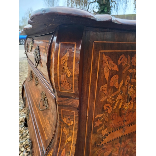 302 - A 19TH CENTURY DUTCH WALNUT AND FLORAL MARQUETRY INLAID BOMBE CHEST
The cartouche top above three lo... 