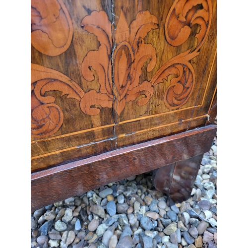 302 - A 19TH CENTURY DUTCH WALNUT AND FLORAL MARQUETRY INLAID BOMBE CHEST
The cartouche top above three lo... 