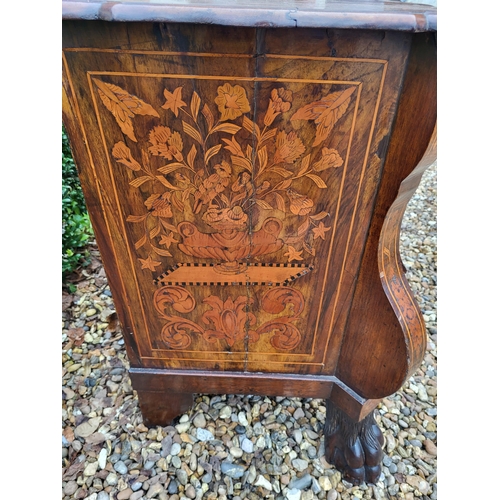 302 - A 19TH CENTURY DUTCH WALNUT AND FLORAL MARQUETRY INLAID BOMBE CHEST
The cartouche top above three lo... 