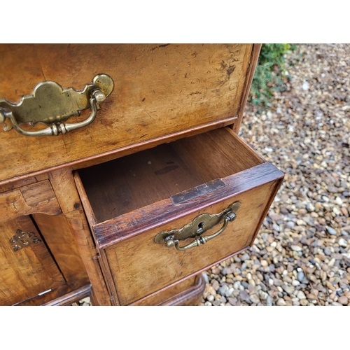 305 - AN 18TH CENTURY BURR WALNUT KNEEHOLE DESK
With an arrangement of seven drawers and central cupboard,... 