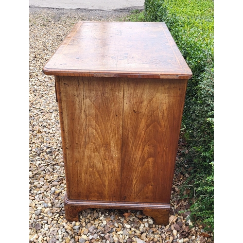 305 - AN 18TH CENTURY BURR WALNUT KNEEHOLE DESK
With an arrangement of seven drawers and central cupboard,... 