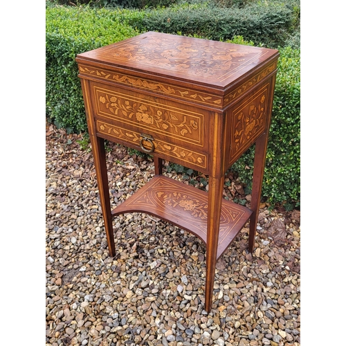 309 - A 19TH CENTURY DUTCH WALNUT AND FLORAL MARQUETRY INLAID LADIES’ WORK TABLE
With rise and fall top ab... 