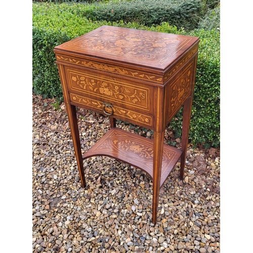 309 - A 19TH CENTURY DUTCH WALNUT AND FLORAL MARQUETRY INLAID LADIES’ WORK TABLE
With rise and fall top ab... 