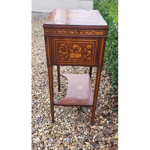 309 - A 19TH CENTURY DUTCH WALNUT AND FLORAL MARQUETRY INLAID LADIES’ WORK TABLE
With rise and fall top ab... 