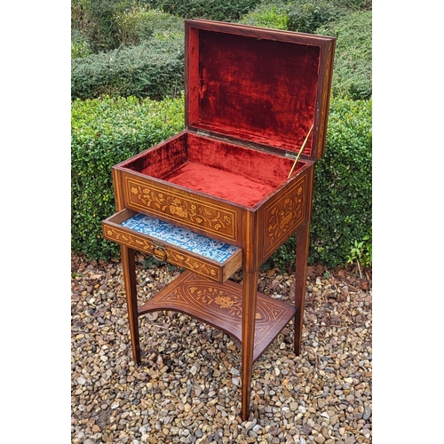 309 - A 19TH CENTURY DUTCH WALNUT AND FLORAL MARQUETRY INLAID LADIES’ WORK TABLE
With rise and fall top ab... 