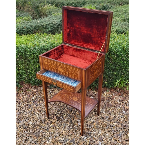 309 - A 19TH CENTURY DUTCH WALNUT AND FLORAL MARQUETRY INLAID LADIES’ WORK TABLE
With rise and fall top ab... 