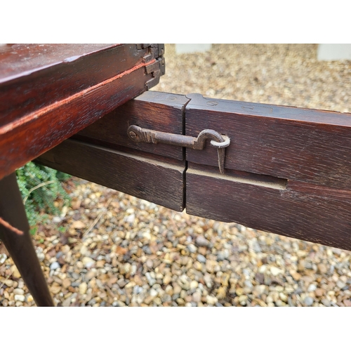 315 - AN 18TH CENTURY MAHOGANY FOLD OVER CARD TABLE
With inverted break front top, enclosing red baize sur... 