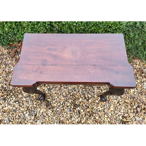 315 - AN 18TH CENTURY MAHOGANY FOLD OVER CARD TABLE
With inverted break front top, enclosing red baize sur... 