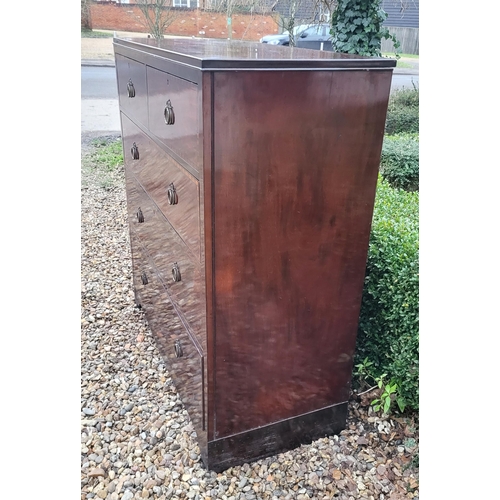 318 - A 19TH CENTURY MAHOGANY CHEST
With two short and three long drawers with brass handles, on bracket f... 