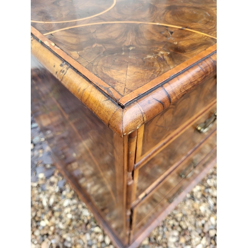 319 - AN EARLY 18TH CENTURY OLIVE WOOD AND LINE INLAID OYSTER VENEERED CHEST
Of two short above three long... 