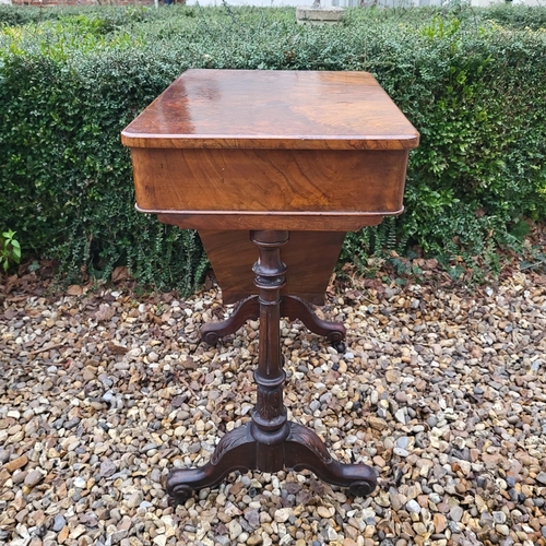 320 - A VICTORIAN WALNUT LADIES’ WORK TABLE
With single drawer and basket, on acanthus carved turned suppo... 